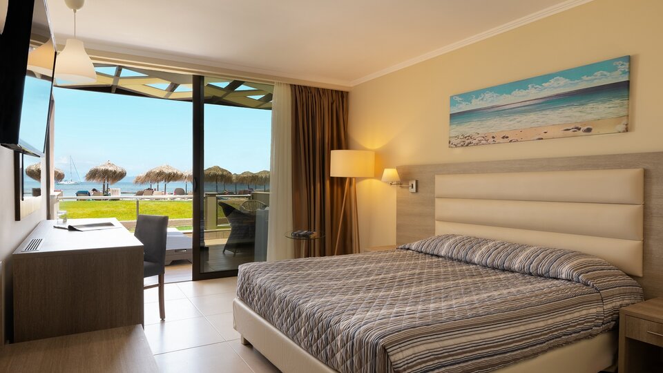 Tiara Holidays - Canvas by Mitsis Messonghi - beach front bungalow sea view - bedroom